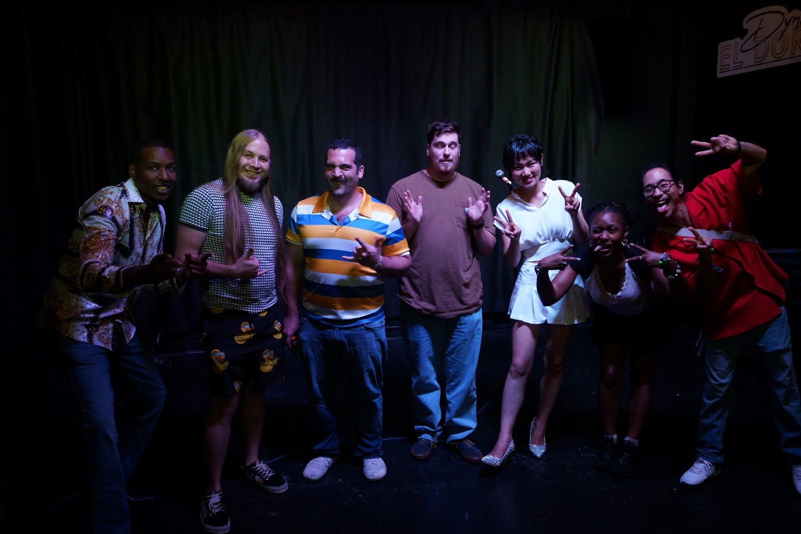 Ginger Phoenix on stage with fellow comedians after a show